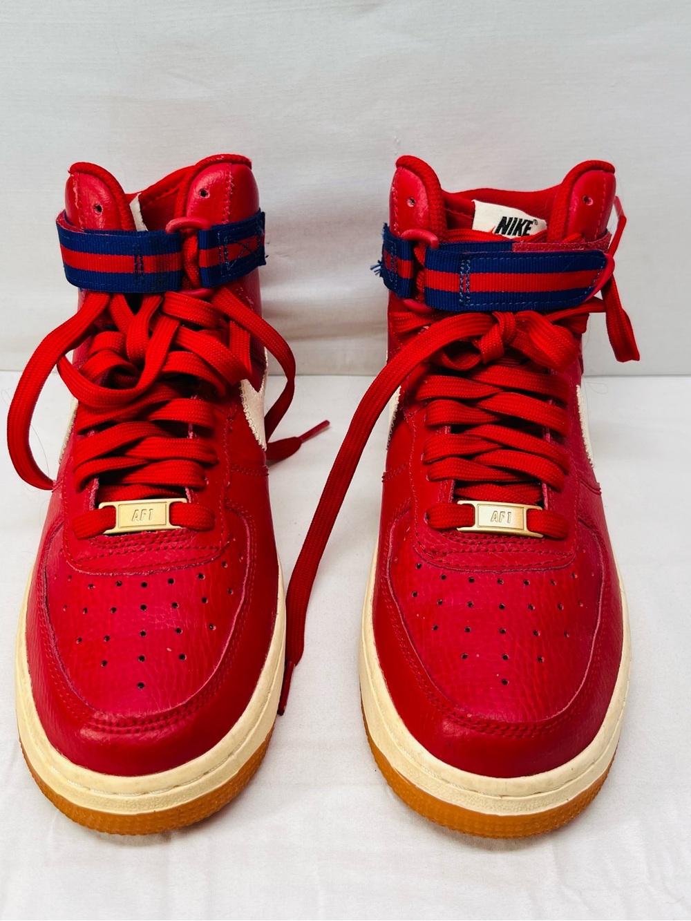Nike Red High-Top Sneakers with Blue Straps